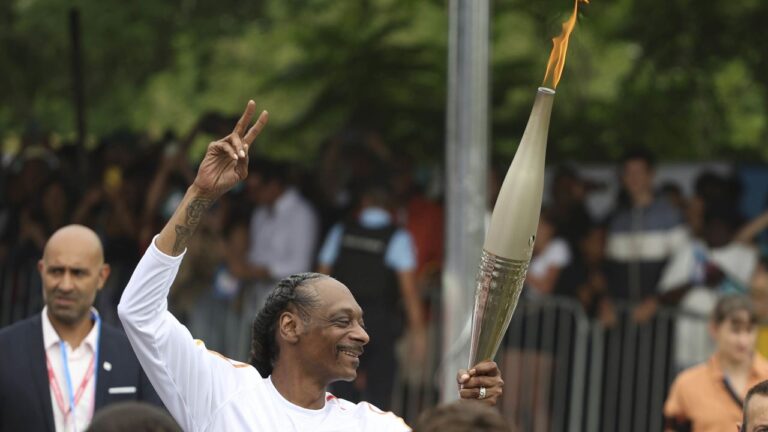 Snoop Dogg Carries the Olympic Torch Before 2024 Paris Games