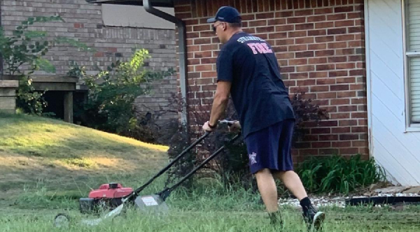 Oklahoma Firefighter On Evening Walk Helps Woman Struggling To Mow Her Lawn