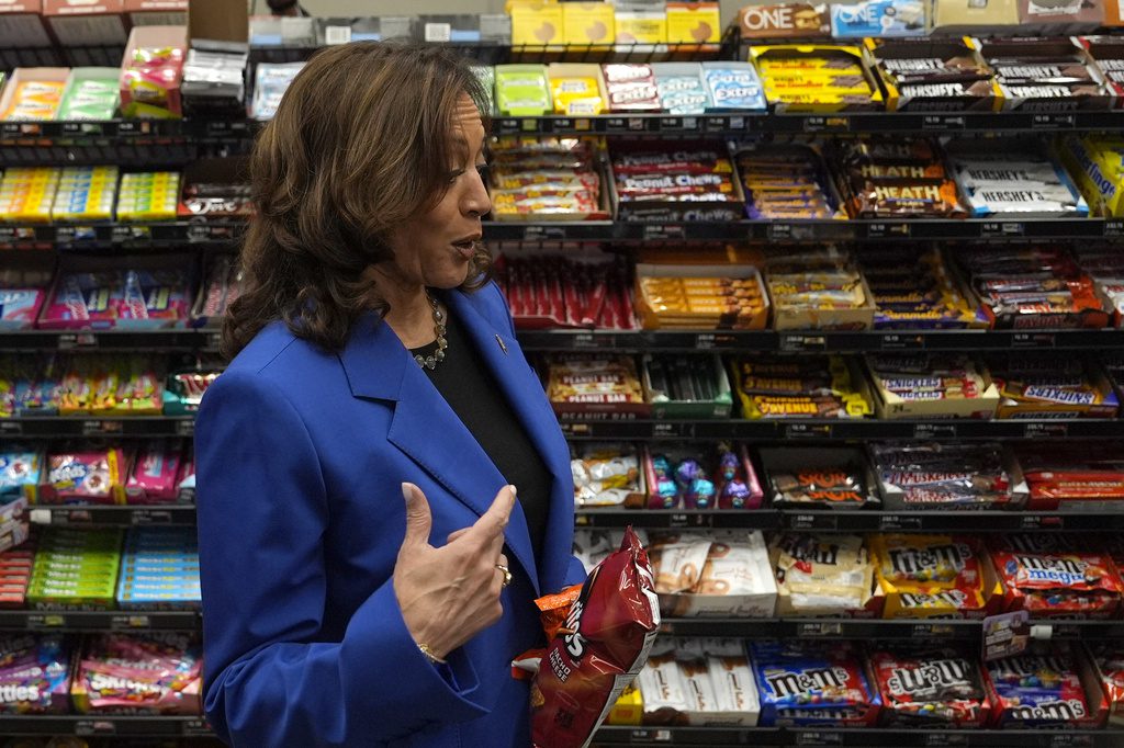 Democratic presidential nominee Vice President Kamala Harris holds a bag of Doritos chips at Sheetz convenience store during a campaign stop, Sunday, Aug. 18, 2024, in Coralpolis, Pa. (AP Photo/Julia Nikhinson)