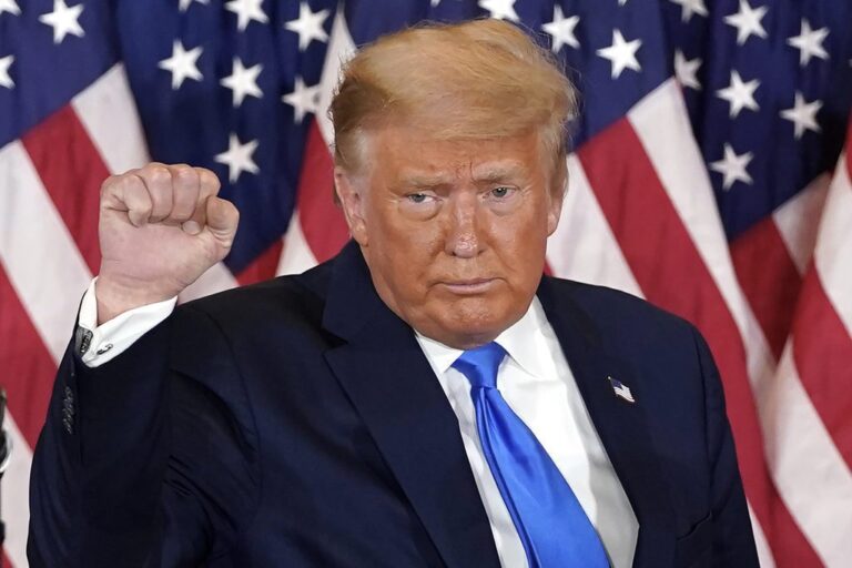 FILE - President Donald Trump pumps his fist after speaking in the East Room of the White House, early Wednesday, Nov. 4, 2020, in Washington. Trump is already laying a sweeping set of policy goals should he win a second term as president. Priorities on the Republican