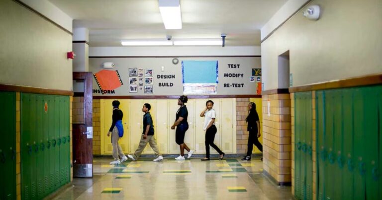 Can financial incentives and holding students back improve attendance in Detroit?