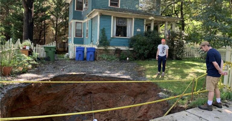 A massive sinkhole opened in Merrimon Avenue in 2019, which property owners unsuccessfully tried to fill in.