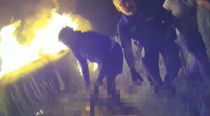 Police Officer Smashes Way Into Burning Vehicle To Rescue 68-Year-Old Woman