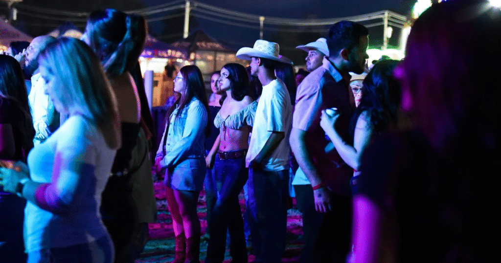 Spinning rides, swirling rumors: Talk of ICE raid mars county fair’s attempt to showcase Mexican band
