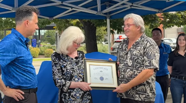 Couple Accidentally Becomes Grill Hotline —  Gets Honored By Company
