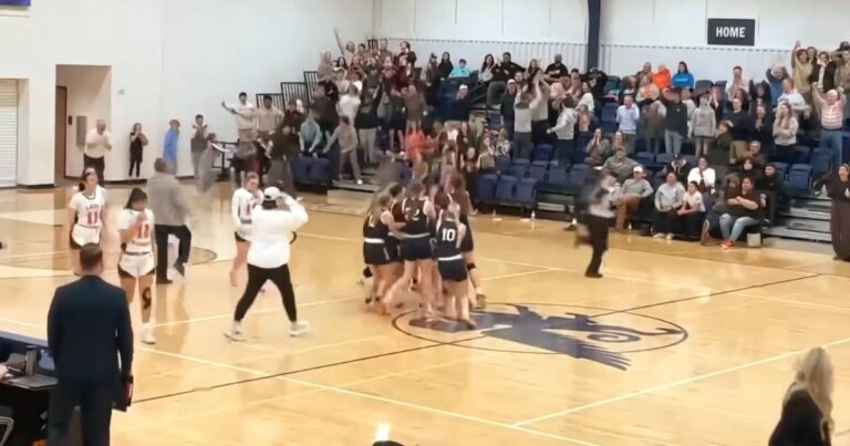 basketball team gives back trophy