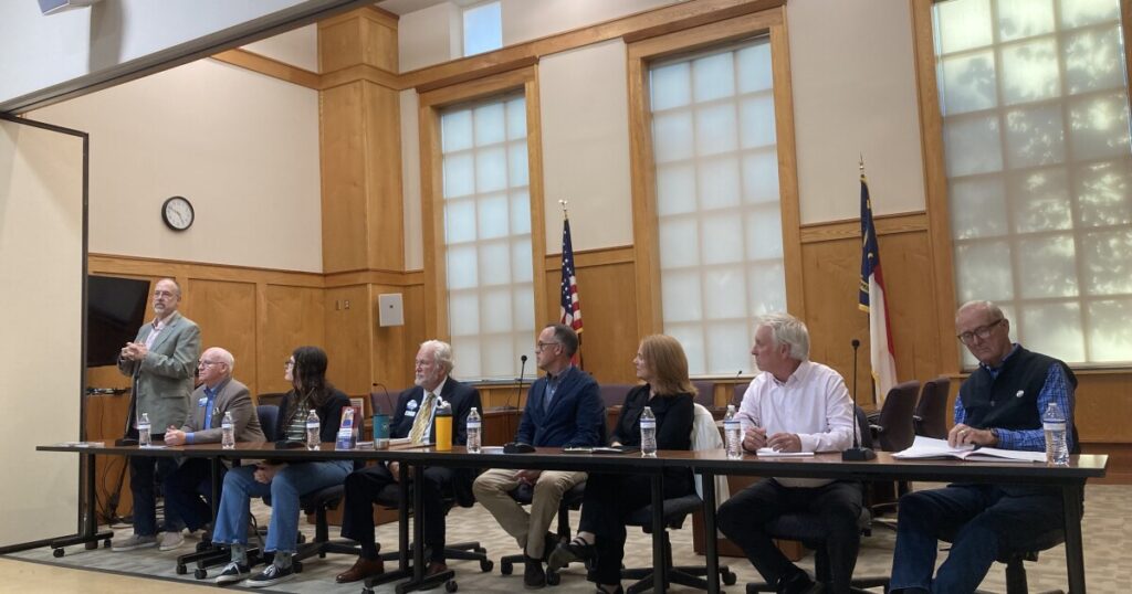 A sign next to the site of the future AdventHealth hospital in Weaverville.