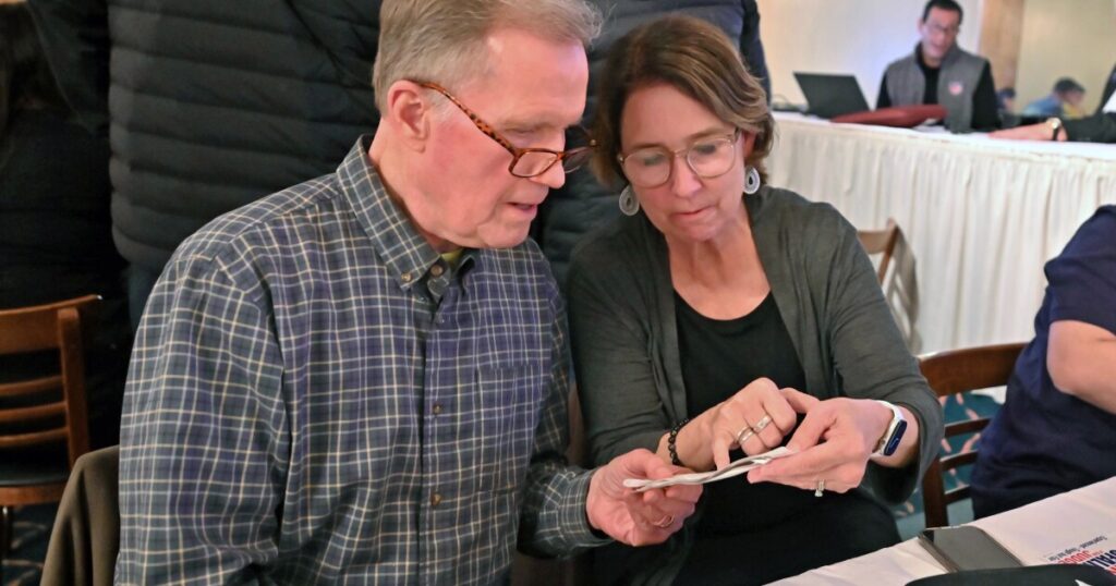Luzerne County Councilman John Lombardo, left, talks with friend John Eric Poli at The Knights in Pittston while waiting for election returns Tuesday night, Nov. 4, 2025.