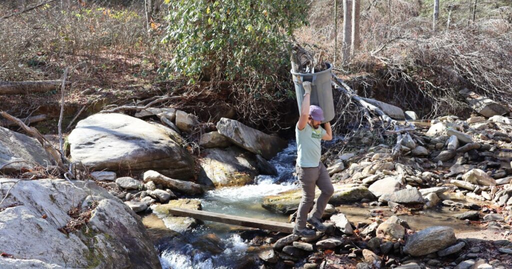 Donovan Green looking at what could be part of a car in a huge pileup on Nov. 12, 2025
