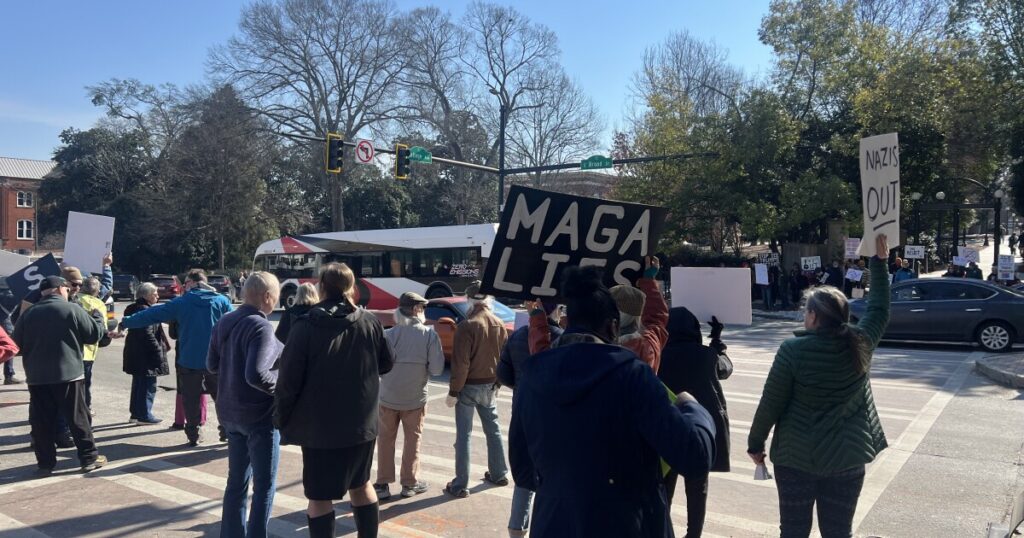 Athens residents rally to protest ICE tactics