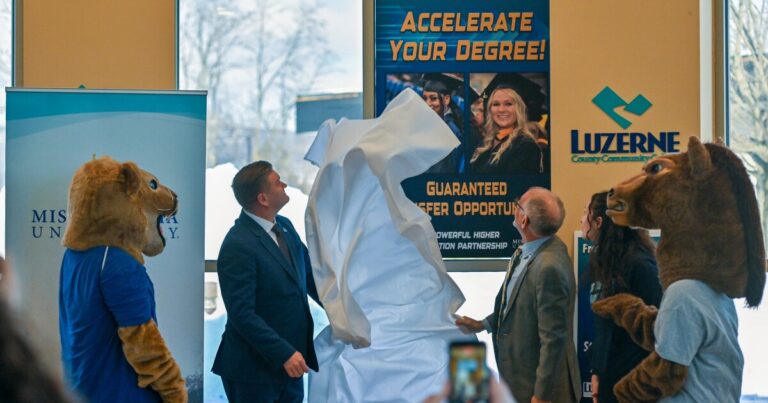 Mascots Blaze and Archie celebrated the program announcement between Luzerne County Community College and Misericordia University.