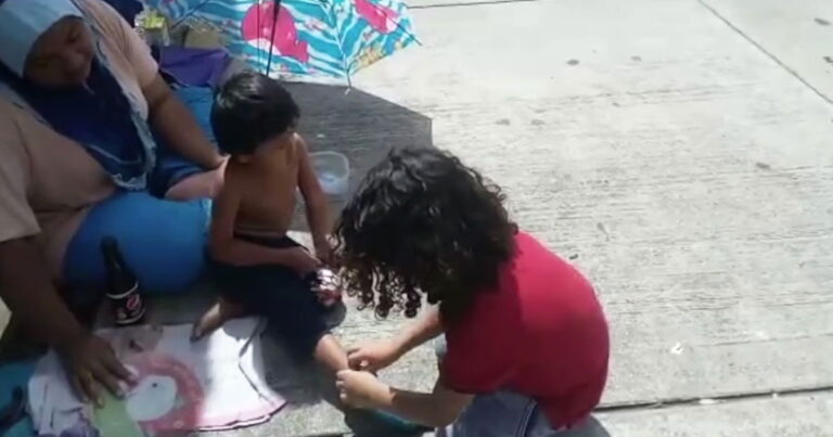 9-Year-Old Boy Gives His Shoes and Socks to a Barefoot Homeless Boy