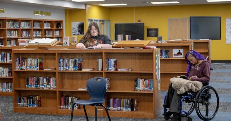 Hollie Smith, the executive principal of the Academy @ Shawnee, believes the school's cellphone ban makes students more engaged with their work and each other.