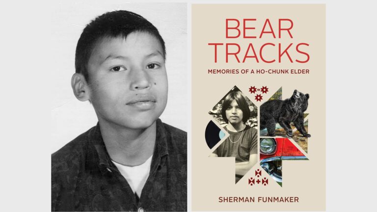 A young boy in a striped shirt holds an ice cream cone, standing in front of a patterned wallpaper.