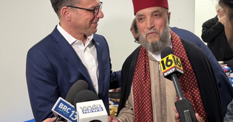 Pennsylvania Gov. Josh Shapiro shakes hands with Imam Azzeddine Sarii during a news conference Feb. 25, 2026, at the Pike County Islamic Center. A gunman fired multiple shots into the mosque early on the morning of Feb. 22, 2026. It was unoccupied at the time and no one was injured. "I want you to know your governor's got your back," Shapiro told the congregation moments before the news conference.