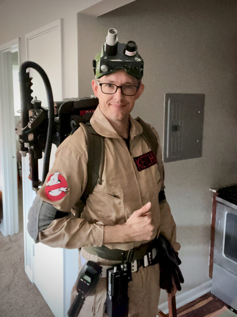 A photo of Nicholas Ketchum wearing his replica “Ghostbusters” proton pack.