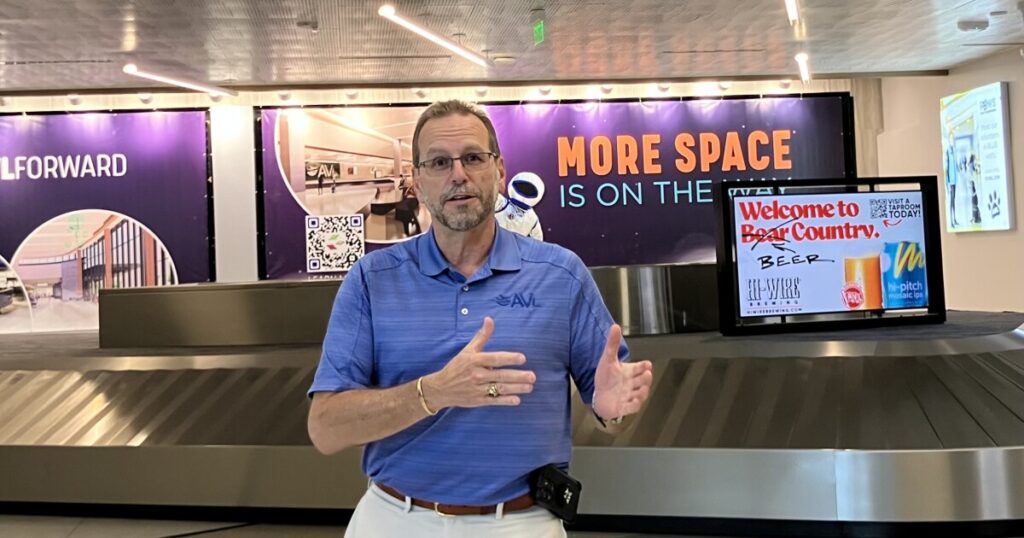 A view of one of the baggage carousels and the new restrooms.