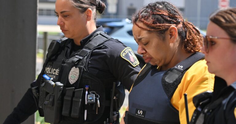 A large photo of La'Nyiah 'Lala' Clark with angel wings was set out for Saturday night's vigil in Wilkes-Barre.