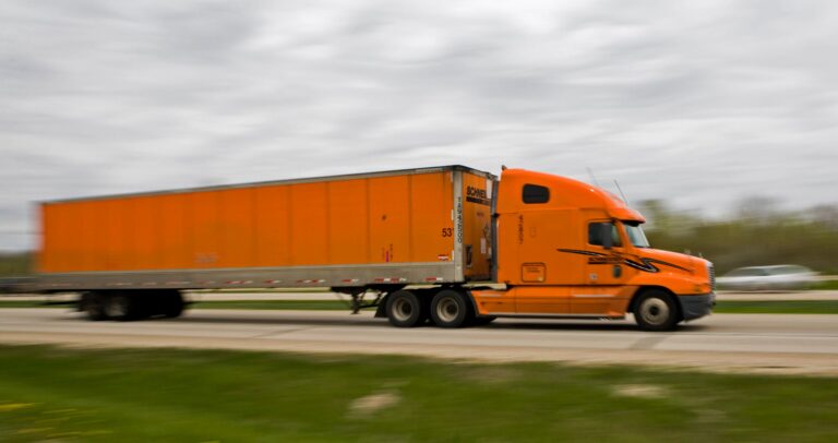 A Schneider truck drives on Highway 41 in Wisconsin