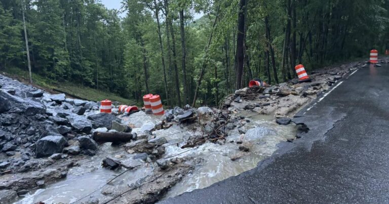 Washing out roads, flooding homes