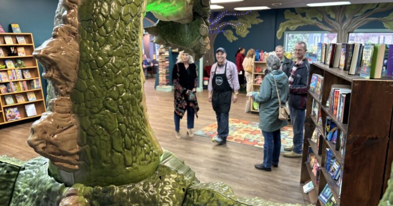 Guests browse the shelves at the Otto Bookstore during a reopening reception Thursday night.