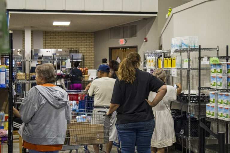 People shop the shelves at the Ritenour Co-Care Food Pantry just outside of St. Louis last week. The nonprofit has seen rising need as grocery prices soar and thousands of Missourians lose federal food assistance. (Photo courtesy of Ritenour Co-Care Food Pantry)