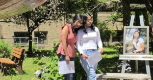 West Scranton High Remembers Rose Hernandez with Memorial Statue - Common Good News Family placed roses on the stem of the statue, which serves as a memorial to Rose Hernandez and other West Scranton High School students gone too soon.