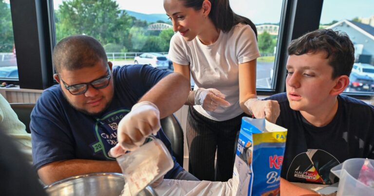University of Scranton speech-language pathology students instructed a cooking class to make red, white and blue pancakes.