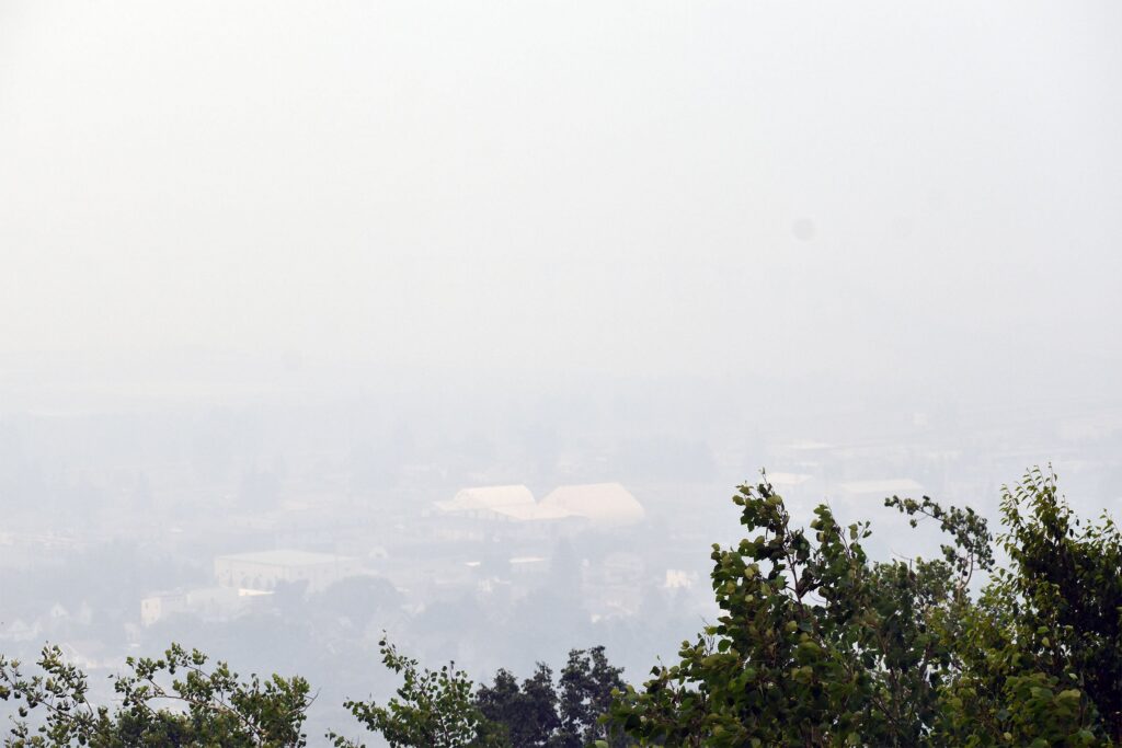 Map of Wisconsin showing widespread hazardous air quality due to smoke; advisory in effect through Friday with health warnings for sensitive groups.