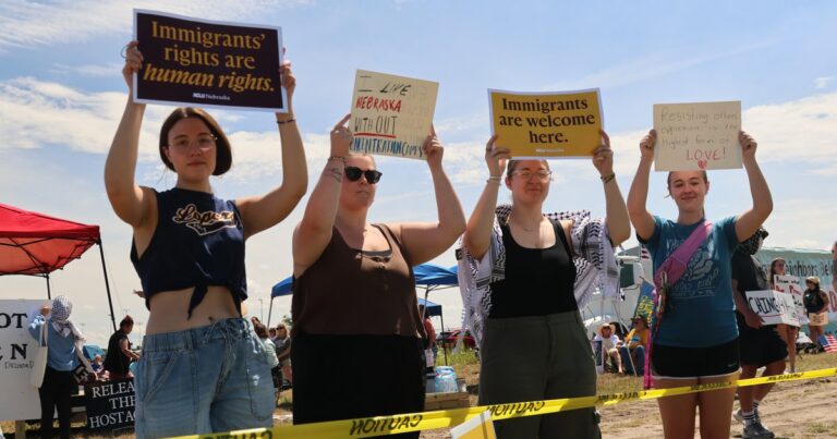 'We have not forgotten': Hundreds rally near McCook ICE detention center, nearly a year after it opened