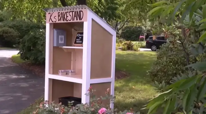 Father and Son Surprise Woman With New Farm Stand After Thieves Steal Hers on Opening Day