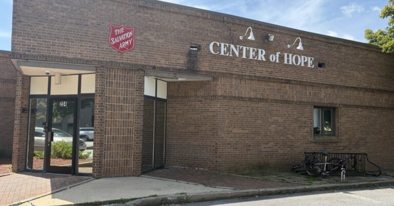Phillip Stokes, the Asheville leader of the Salvation Army, stands in an empty hallway at the Center of Hope.